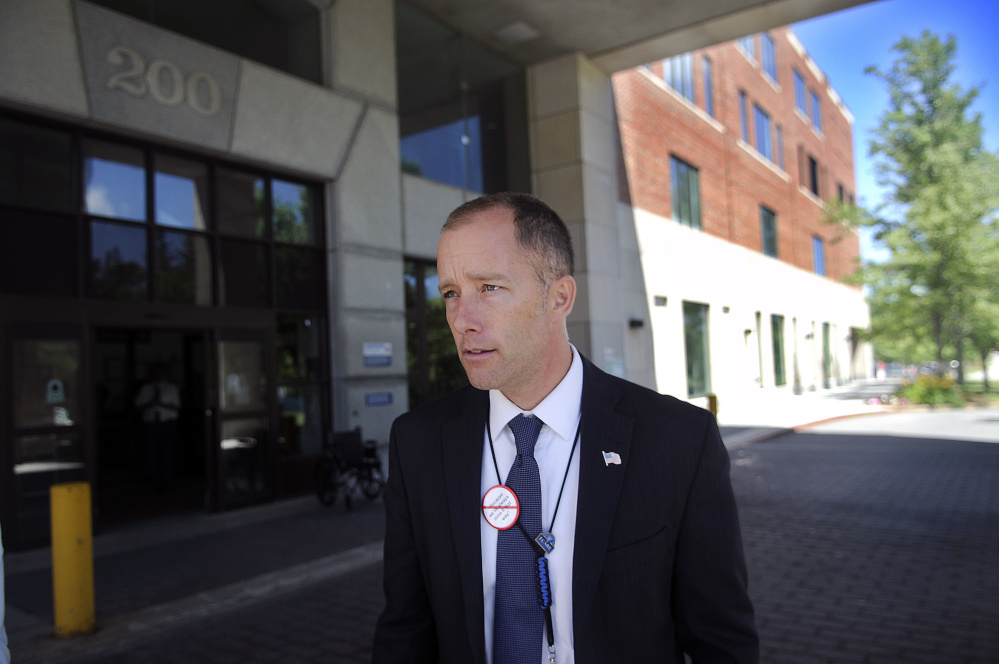 Ryan Lilly, director of the VA Maine Healthcare System hospital at Togus, walks through the hospital Monday during a tour of the facility.