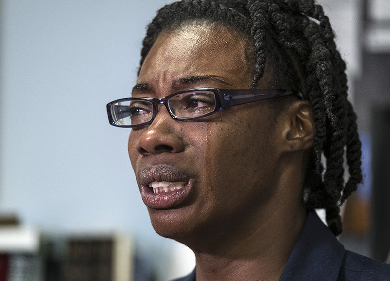 Breaion King is overcome with emotion as she describes being pulled from her car and thrown to the ground by an Austin police officer during a traffic stop in 2015.