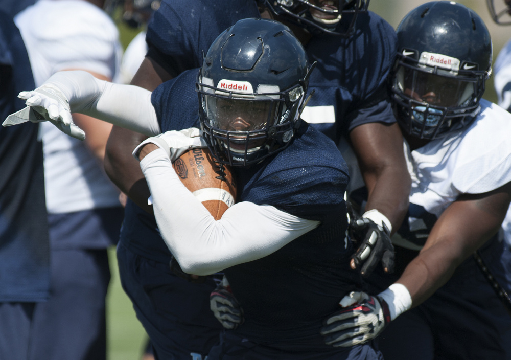 Zaire WIlliams, seen at Monday's practice in Orono, says, "As a team, we want 200 (rushing) yards a game."