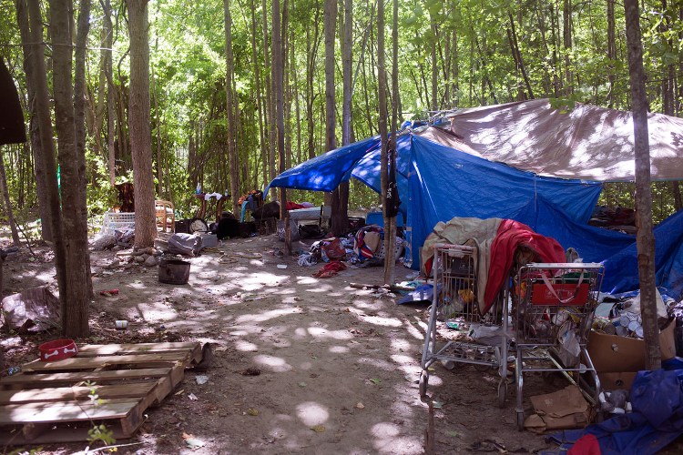 Portland police gave the homeless residents of this encampment behind the Pine Tree Shopping Center until Thursday to move out. Only one camper remained Thursday afternoon, and he was on his way out.
