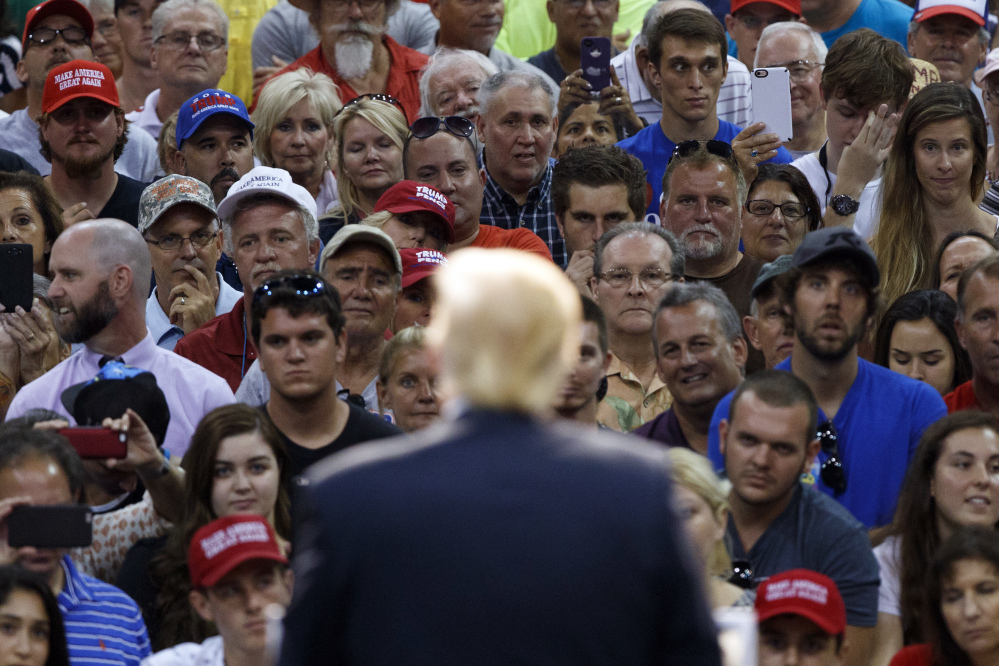 Donald Trump speaks Wednesday at a campaign stop in Daytona Beach, Fla. Meanwhile, Trump's running mate, Indiana Gov. Mike Pence, appeared to break from the candidate by endorsing House Speaker Paul Ryan in his Republican primary race. Trump has hinted that he may not support Ryan or Sen. John McCain, and has even complimented Ryan's opponent.