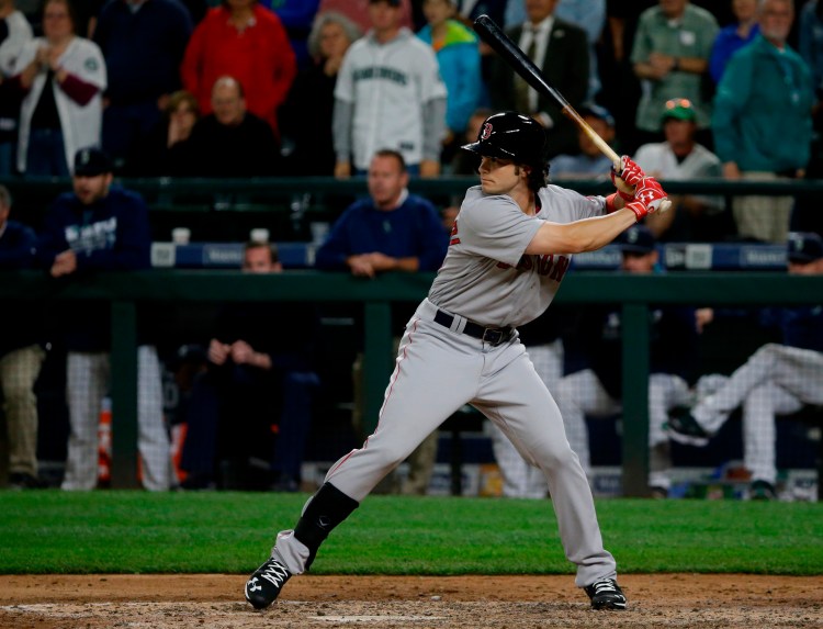 Boston Red Sox's Andrew Benintendi waits for a pitch during a Tuesday's game against the Seattle Mariners in Seattle. (AP Photo/Ted S. Warren)