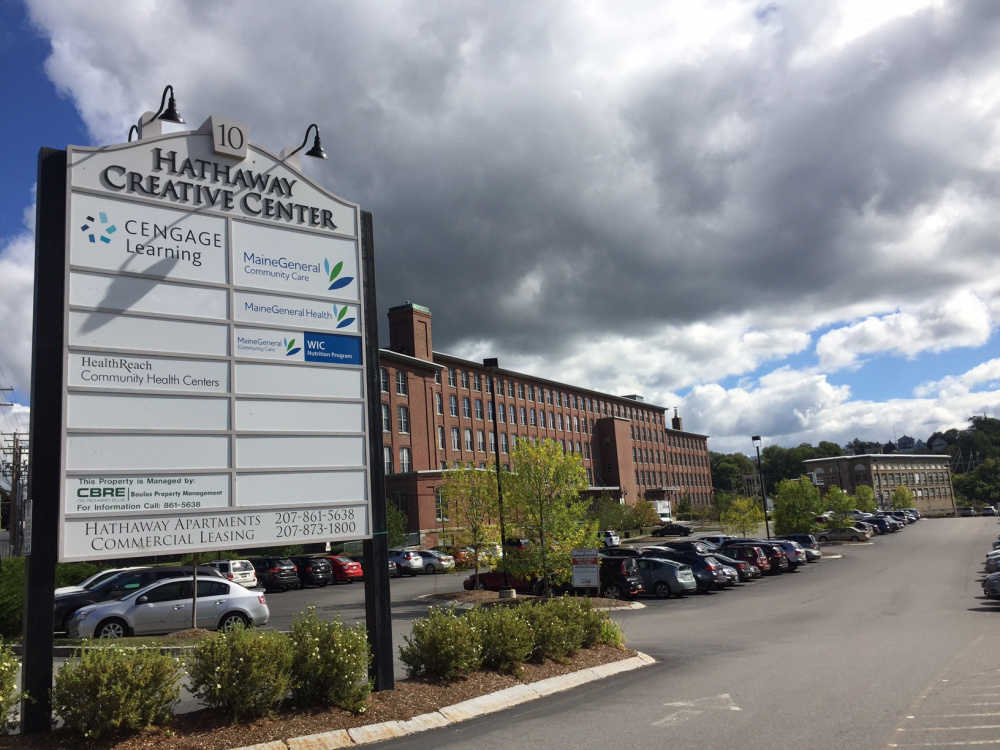 The Hathaway Creative Center off Water Street in Waterville is for sale after being transformed several years ago from a former shirt factory into retail offices and 67 apartments.