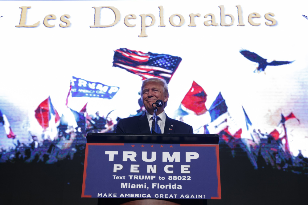 Republican presidential candidate Donald Trump arrives to a campaign rally at the James L. Knight Center on Friday in Miami.