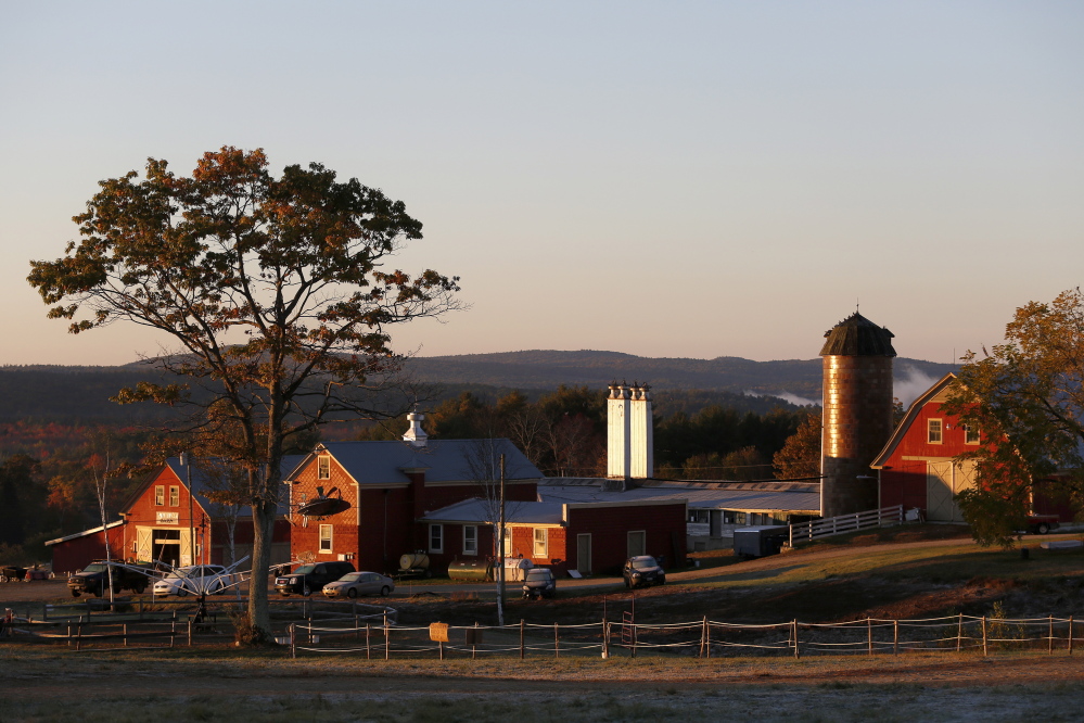 The sun breaks over Harvest Hill Farms in Mechanic Falls on Route 126 on Oct. 12, 2014, the morning after a hayride crash that is now at the center of several criminal charges. Harvest Hill Farms, the farm's mechanic and the hayride driver have all been charged in the crash, which killed Oakland teenager Cassidy Charette and injured more than 20 others.