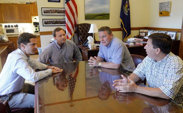 Legislative leaders, left to right, Senate Minority Leader Justin Alfond, House Speaker Mark Eves, Senate President Mike Thibodeau and House Minority Leader Ken Fredette meet Thursday to consider the Legislature's response to Gov. Paul LePage's racially charged and theatening statements. The four reached no agreement on a course of action. 
Shawn Patrick Ouellette/Staff Photographer