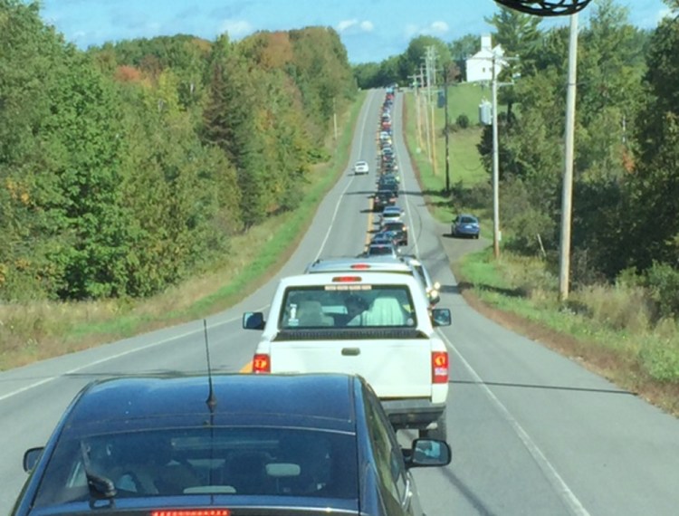 Traffic headed to the Common Ground Fair stretches ahead of the bus from which the author took this picture.