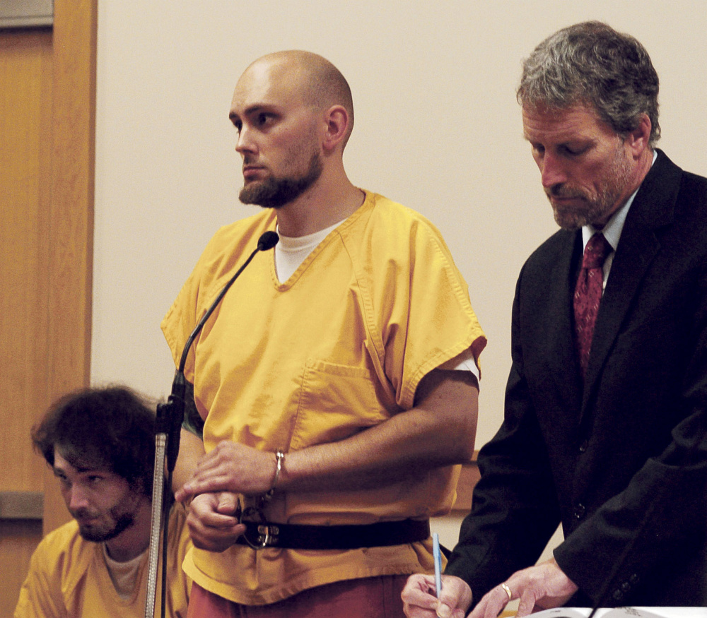 Alexis Casey, center, and his brother Zachary Casey attend a hearing Wednesday on charges of class A arson in Skowhegan District Court. Attorney Phil Mohlar, at right, represented the brothers.