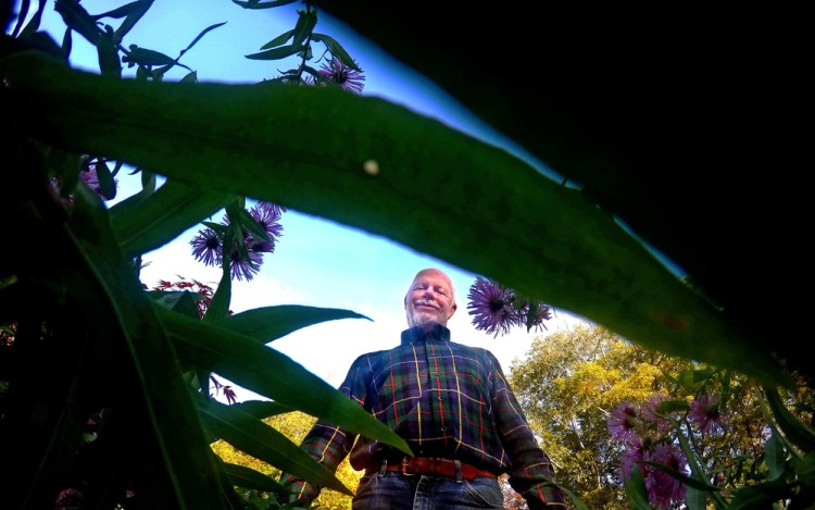 Tom Atwell in his Cape Elizabeth garden.