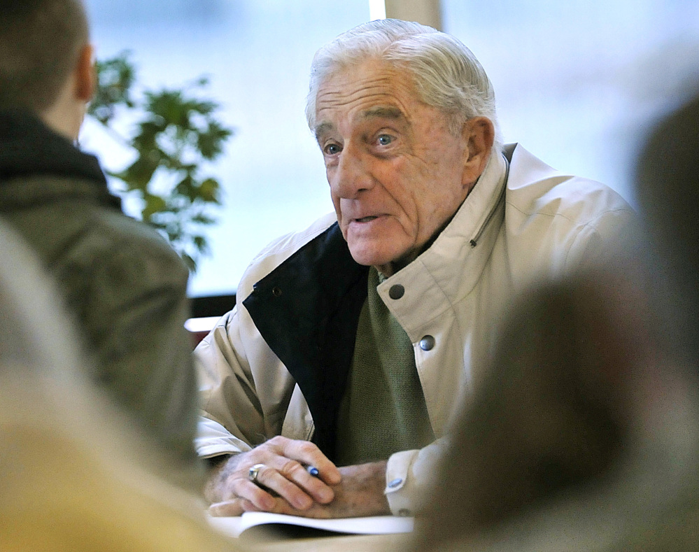 Donn Fendler, whose experiences as a 12-year-old lost on Mount Katahdin were recounted in a classic children's book, chats with a young reader at a book signing in Bangor in 2011. He wrote back to every child who wrote to him.