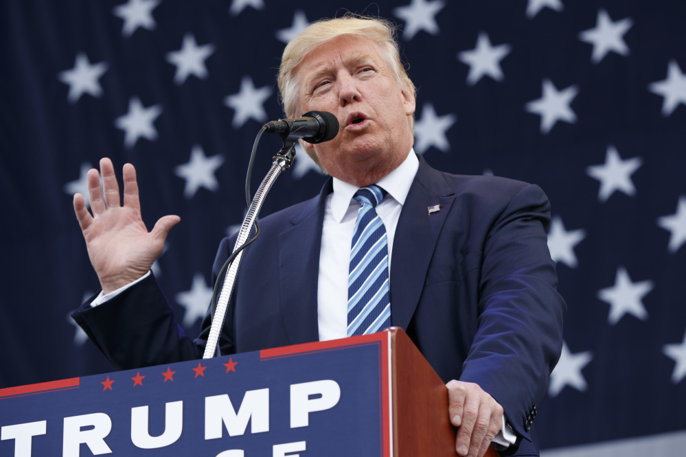 Donald Trump speaks at a campaign rally Friday in Greensboro, N.C. He told the audience that a woman who has accused him of groping her "would not be my first choice, that I can tell you."