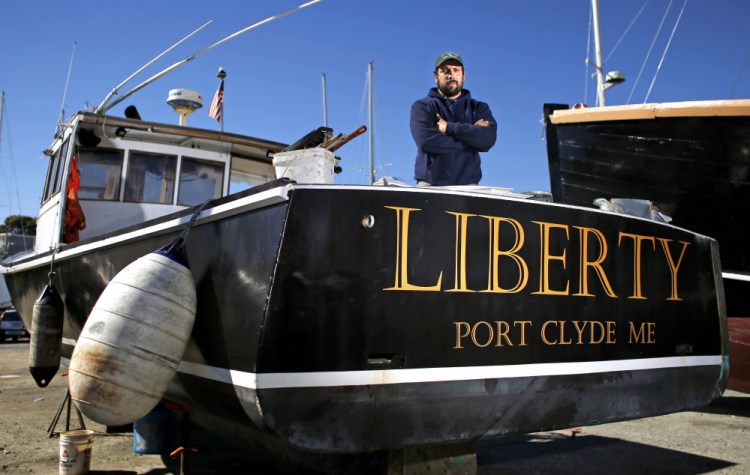 Tony Hooper's lobster boat, parked here at Knight Marine Service in Rockland, has been intentionally sunk three times by someone "who didn't like it when I called him out for messing with my traps." Authorities are investigating and offering a $2,000 reward for information.