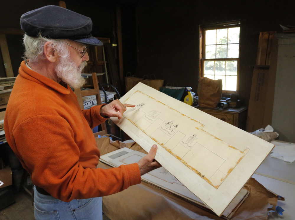 Charlie Ipcar points out a detail on a mural study created by his mother, Dahlov Ipcar, in the 1940s. The long-forgotten mural studies made for a public art project have inspired Charlie Ipcar to organize a concert. The murals were intended for a school in the midwest but never installed and tout her love of folk music.