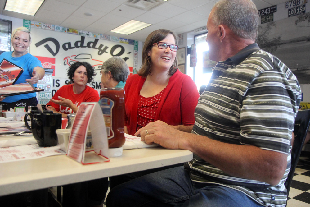 Democrat Emily Cain, who is running for the U.S. House in Maine's 2nd District, chats with Maine House candidate Mike Twitchell, D-Norway, recently at Daddy O's in Oxford. Cain's forthrightness on issues and potential for advancing Maine causes in Washington has earned her our endorsement.