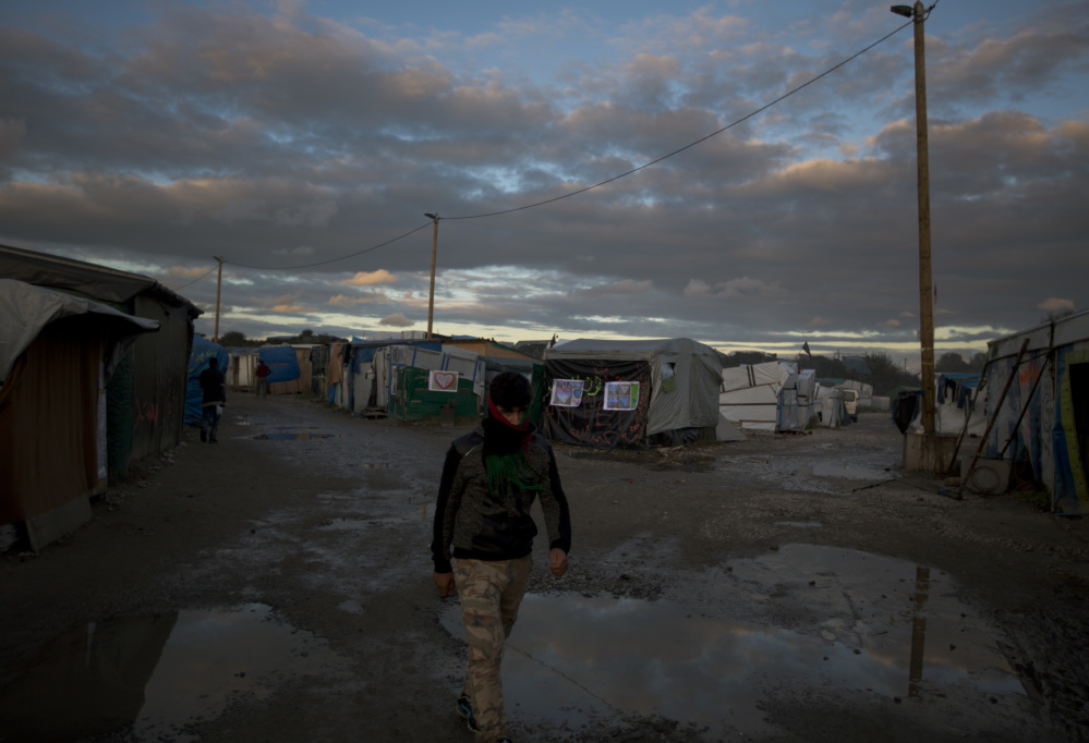 French authorities are going to demolish the makeshift migrant camp known as the "Jungle" near Calais, northern France, shown Saturday. 