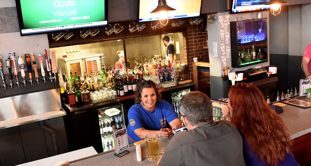 Andrea Shorty takes orders at the Silver Street Tavern in Waterville.