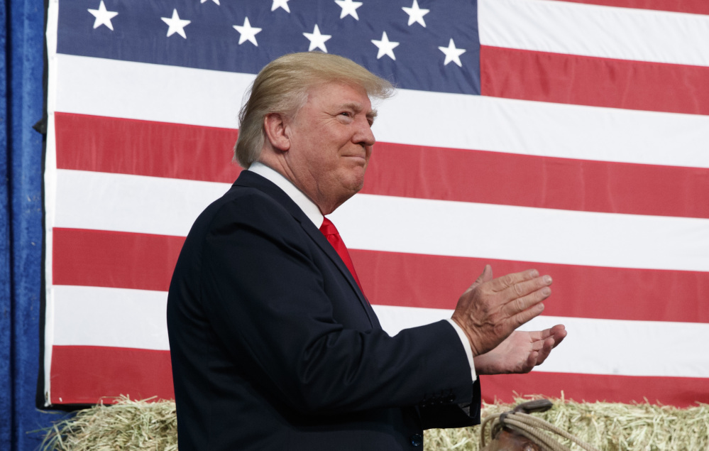 Republican presidential candidate Donald Trump arrives to speak at a campaign rally at the Jefferson County Fairgrounds.
