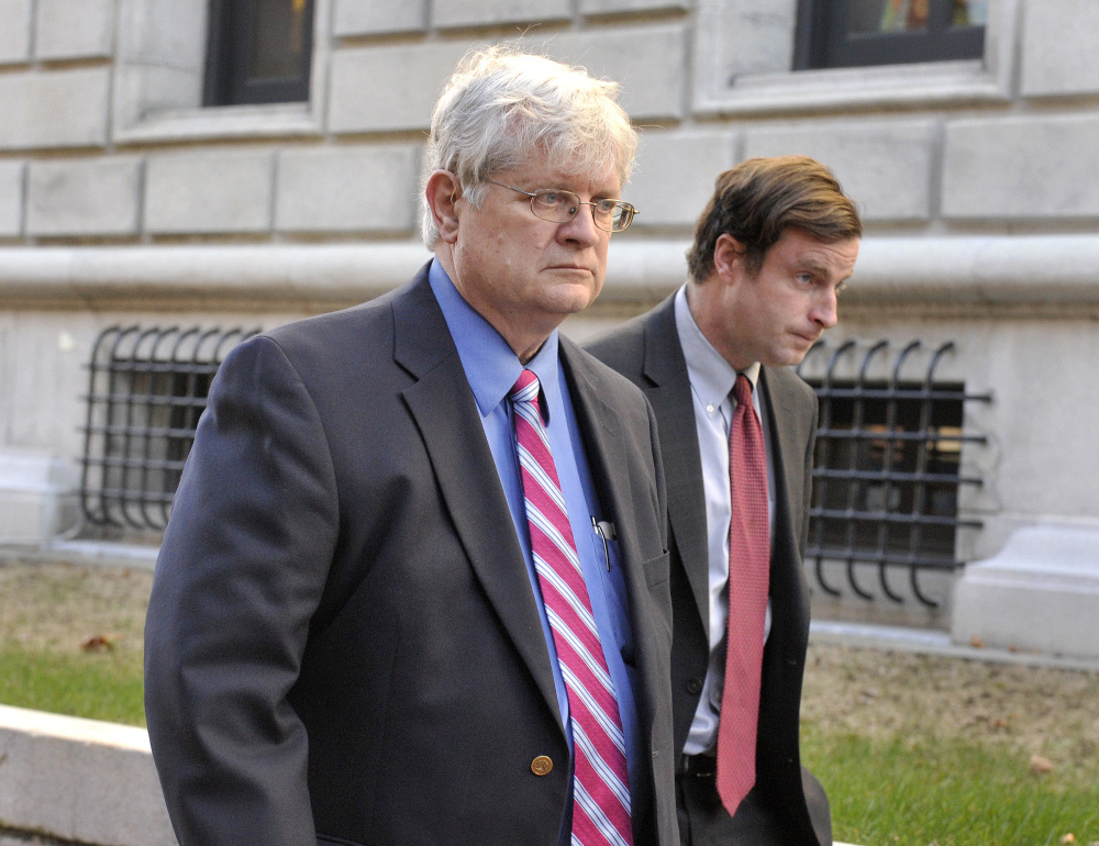 Dr. Joel Sabean and one of his lawyers, Alfred C. Frawley IV, leave the federal courthouse in Portland after his conviction in November.