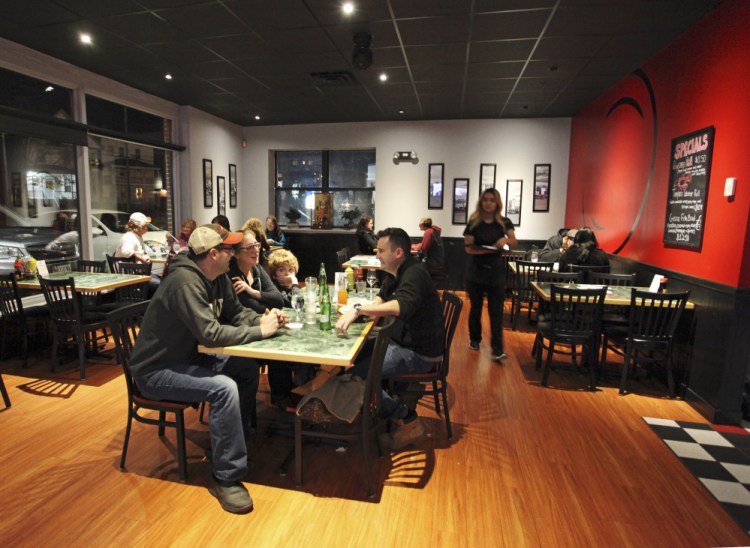 Patrons enjoy the food and atmosphere at Ginza Town. 