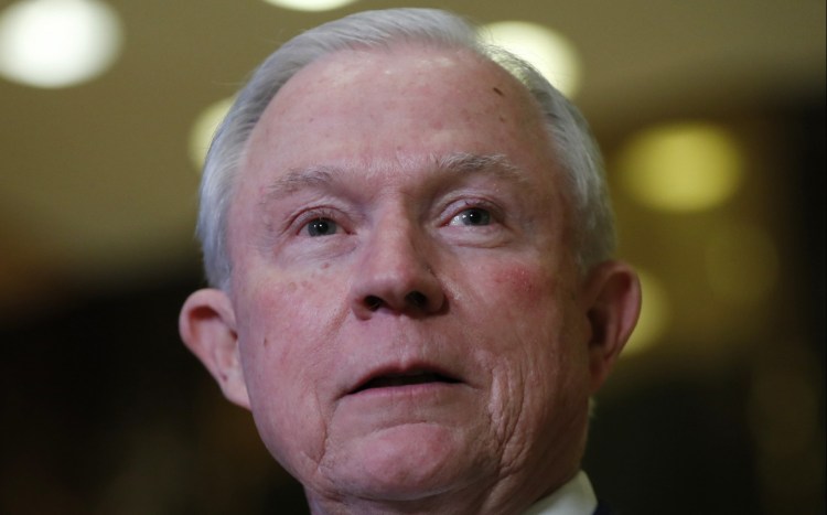 Sen. Jeff Sessions, R-Ala. speaks to media at Trump Tower in New York. 