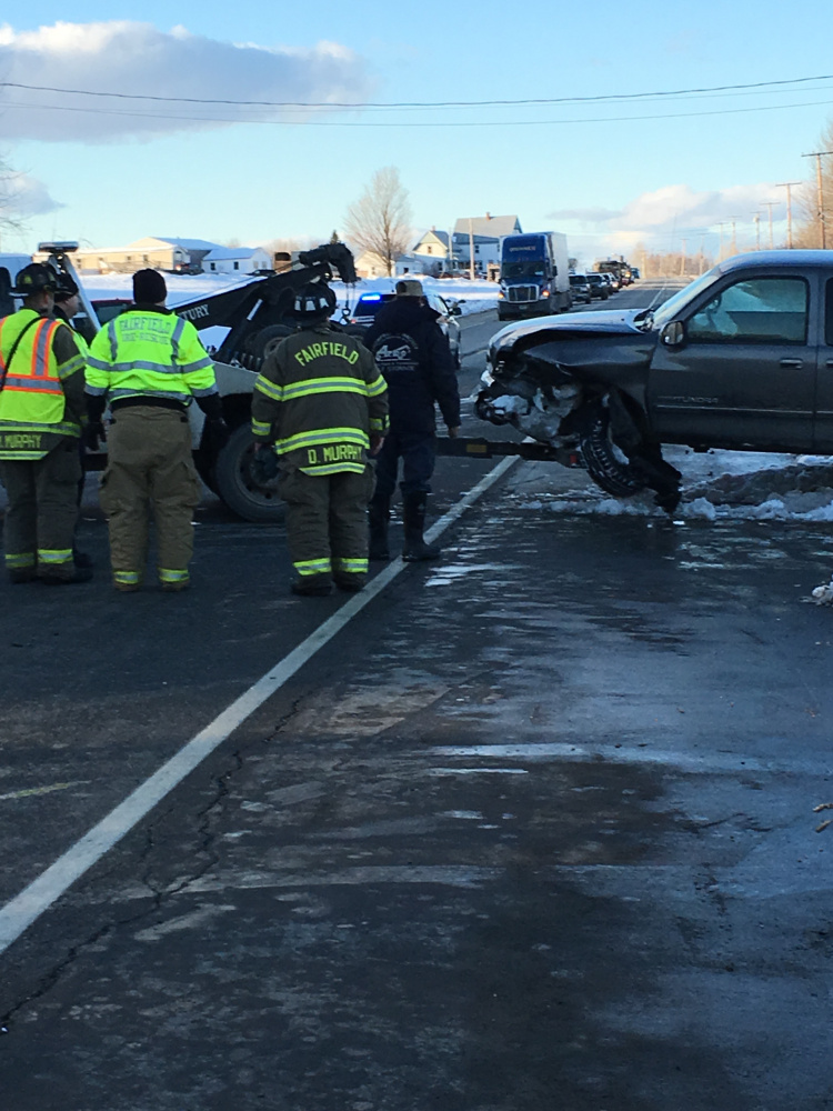 This pickup truck was damaged Friday after trying to turn into the Fairfield Antique Mall and colliding with a van carrying Good Will-Hinckley students. Five people, including students, were injured.