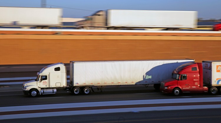 Interstate 35, clogged with wheezing 18-wheelers, starts in Laredo on its 1,600-mile straight shot to the Canadian border.<em>Associated Press/Eric Gay</em>