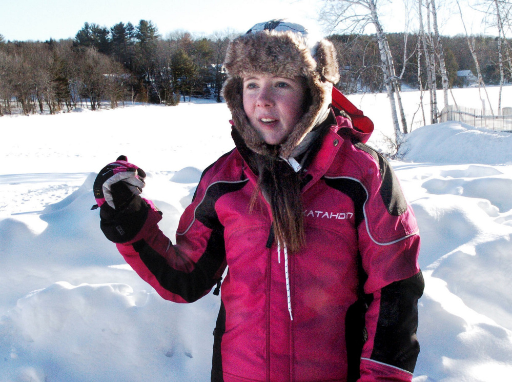 Megan Belmont of Clinton says she was surprised that a snowmobiler drove onto thin ice and into the water Saturday on Messalonskee Lake in Oakland. 