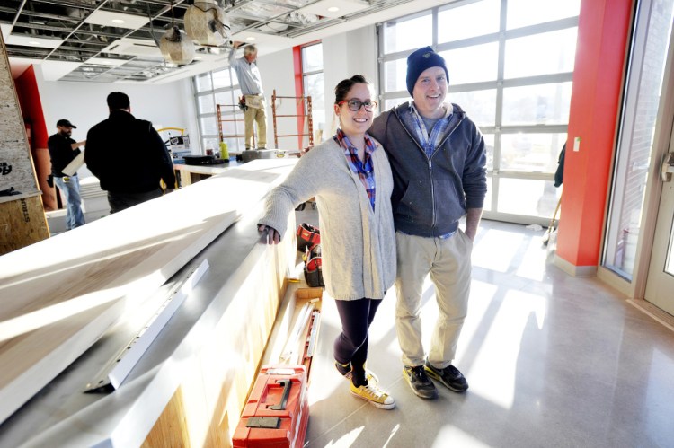 Jenna Friedman and Clay Norris at the future home of Baharat restaurant at the corner of Anderson and Fox streets in Portland. Friedman and Norris are converting their beloved blue food truck, CN Shawarma, to the 30-seat Baharat.