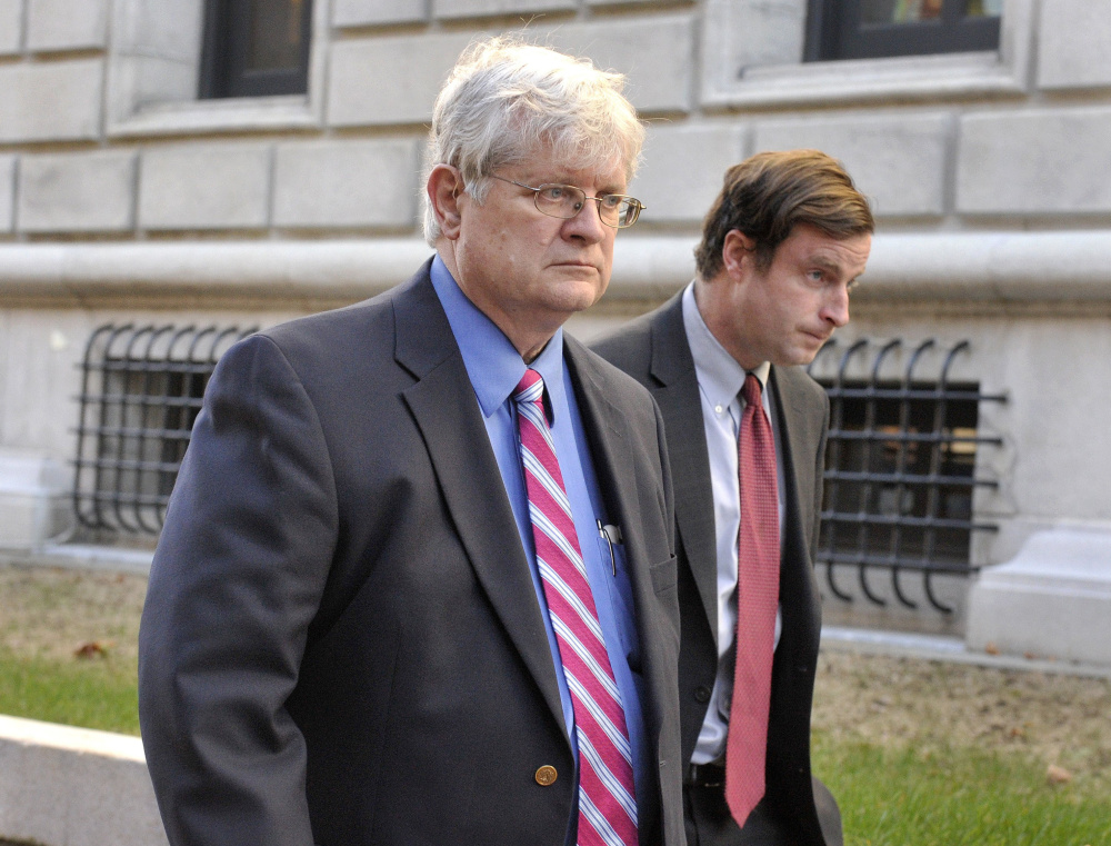 Dr. Joel Sabean and one of his lawyers, Albert C. Frawley, leave the federal courthouse in Portland after his conviction in November.