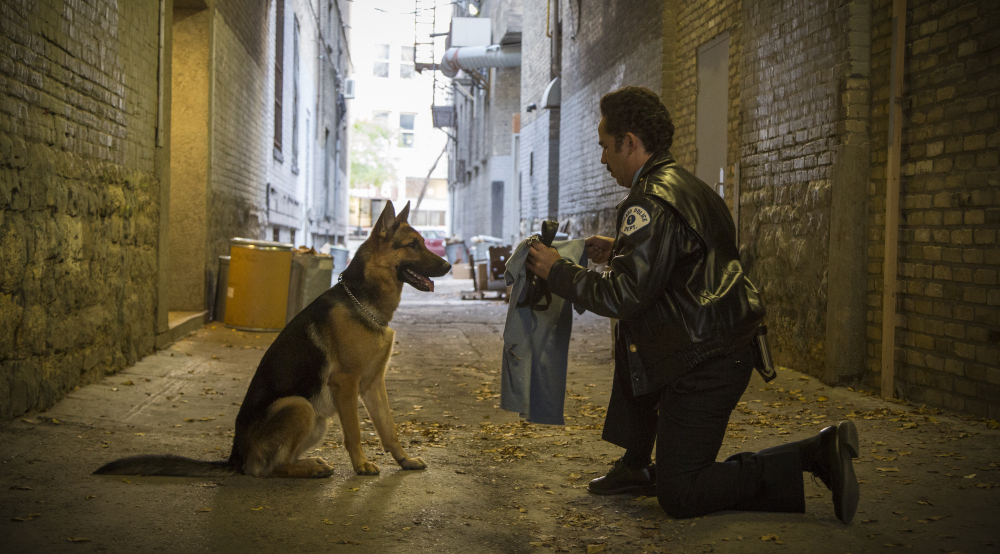 John Ortiz and his canine partner appear in "A Dog's Purpose," which earned $18.4 million in its debut weekend.