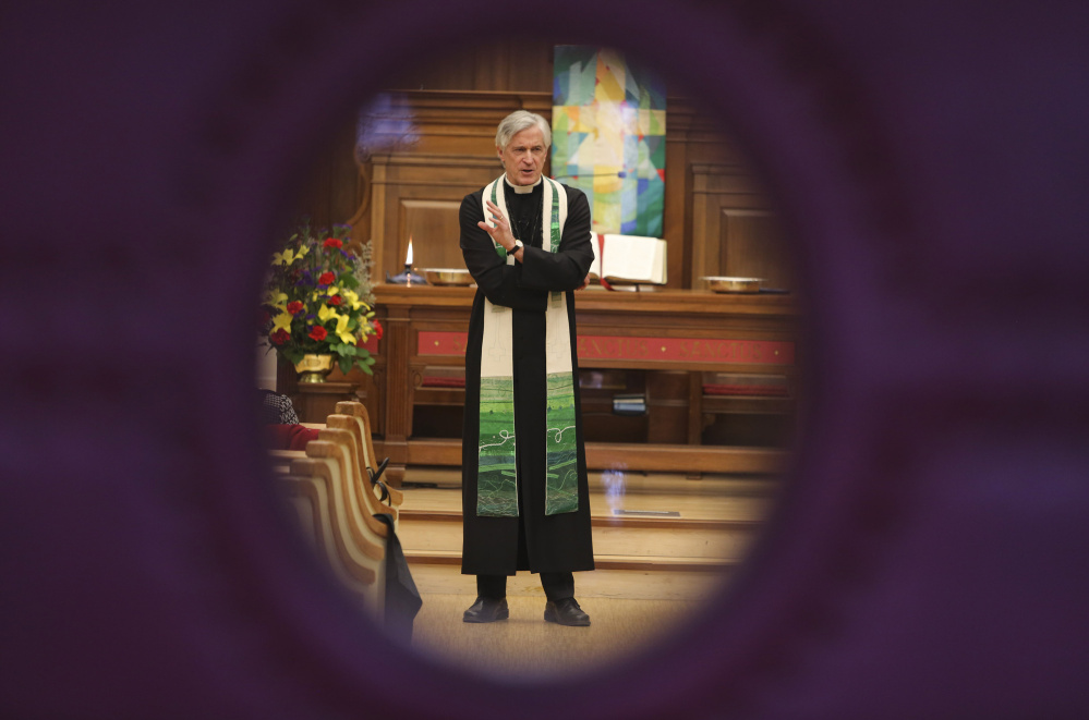 The Rev. Roger Gench preaches at New York Avenue Presbyterian Church in Washington, D.C., about the need for Presbyterians to welcome refugees to the United States on Sunday.