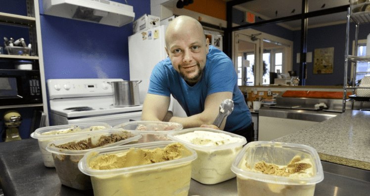 Andrew Warren displays some of the ice cream he served at his Catbird Creamery in Westbrook in 2014. The business has closed and is for sale. 