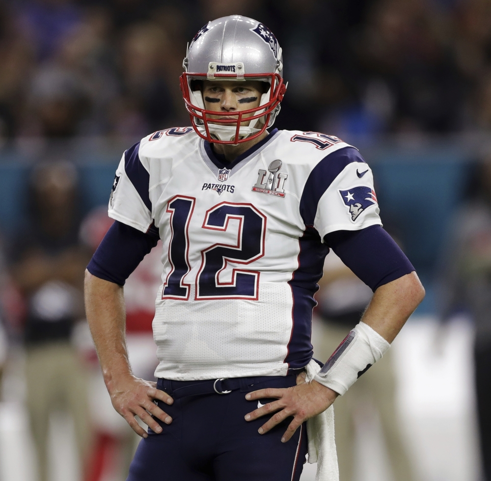 New England Patriots' Tom Brady stands on the field, during the first half of the NFL Super Bowl 51 football game against the Atlanta Falcons, Sunday, Feb. 5, 2017, in Houston. (AP Photo/Darron Cummings)