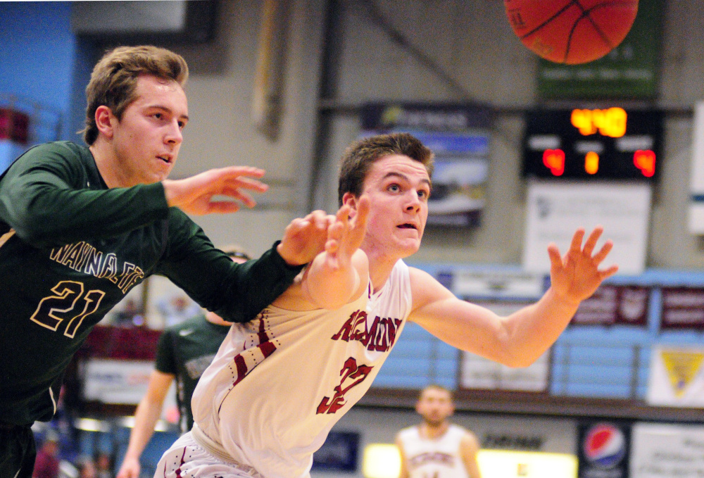 Photo by Joe Phelan/Kennebec Journal
Waynflete's Christian Brooks, left, and Richmond's Matt Holt chase a ball going out of bounds during a Class C South basketball quarterfinal Monday at the Augusta Civic Center. Waynflete advanced with a 57-52 win.