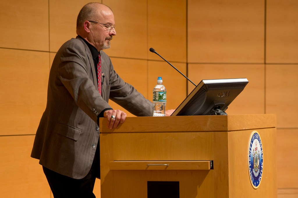 Rep. Lawrence Lockman, seen speaking at the University of Southern Maine in February, says anyone who is a skeptic about climate change "is immediately labeled a heretic who must be silenced."