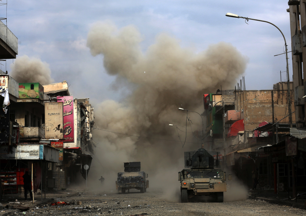 Three roadside bombs laid by Islamic State militants explode in Mosul, Iraq, on March 8, killing one of the Iraqi engineers trying to defuse the devices. Groups like the Islamic State didn't exist in 2001, so it's absurd to say that the war authorization passed after the Sept. 11 attacks applies to them.