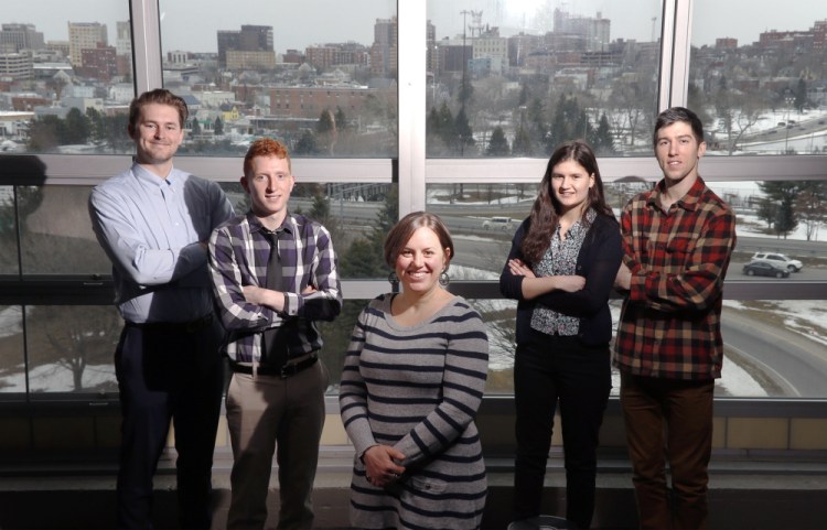 Lora Winslow, center, directs Manomet's U360 program, which offers internships to college students interested in sustainability in small businesses. With her, from left, are Bobby Jordan, Caleb Pulliam, Leah Soloway and Karol Olszynski.