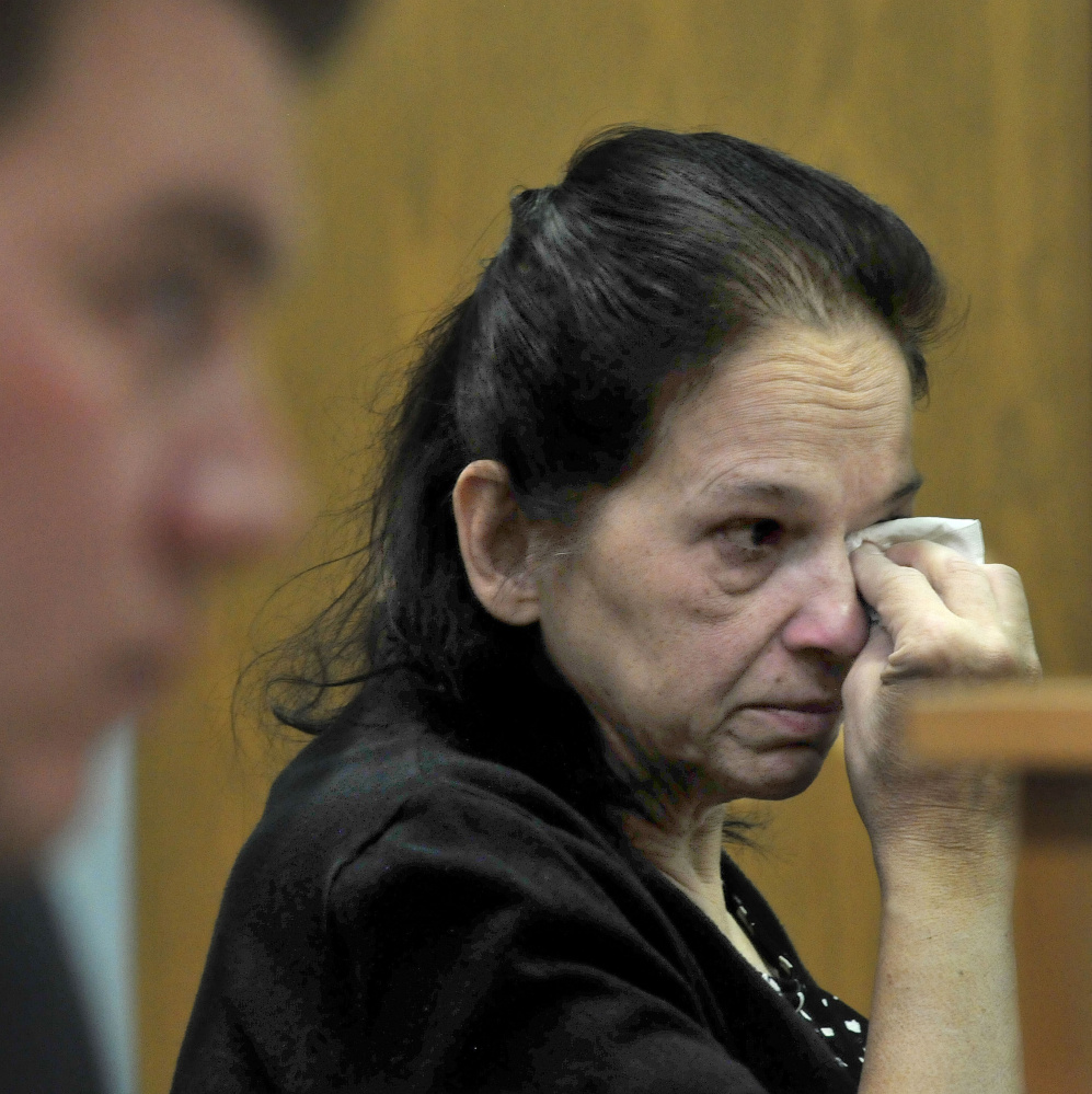 Linda Janeski, the current owner of Dakota, a dog that has been ordered to be euthanized after repeated attacks on other dogs, wipes tears away Tuesday after Judge Valerie Standfill refused to reverse the decision in Waterville District Court. Janeski has appealed the decision.