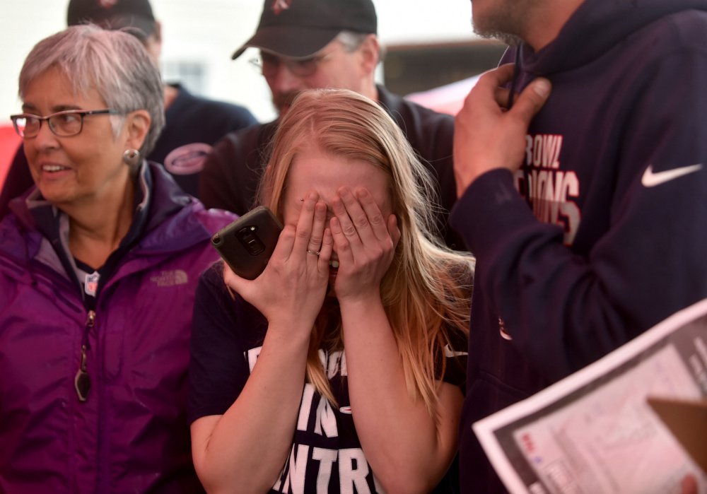 Staff photo by Michael G. Seamans
Taylor Campbell, of Clinton, becomes emotional Wednesday as Rob Ninkovich, of the New England Patriots, signs autographs at Hammond Lumber Co. in Belgrade during a meet and greet with fans.