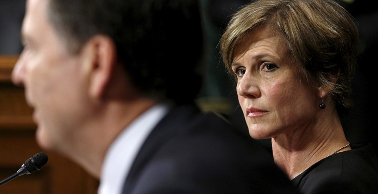 Then-Deputy Attorney General Sally Yates listens as FBI Director James Comey speaks during a Senate hearing on July 8, 2015. 