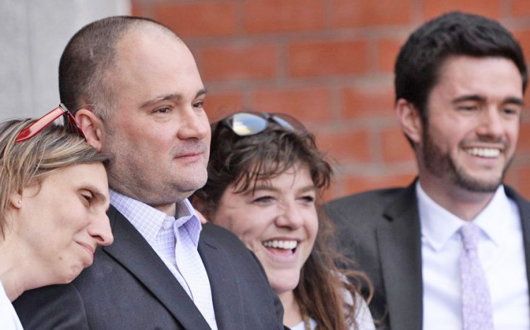 Justice Joyce Wheeler has ordered a radio station and a TV station to produce outtakes of interviews with the prosecutor in the case of  Anthony Sanborn Jr., second from left, as he challenges his conviction in the 1989 murder of Jessica L. Briggs. Sanborn's wife, Michelle, left, his attorney Amy Fairfield and paralegal Keegan Fairfield accompanied him April 13 as he was freed on bail set by Wheeler.