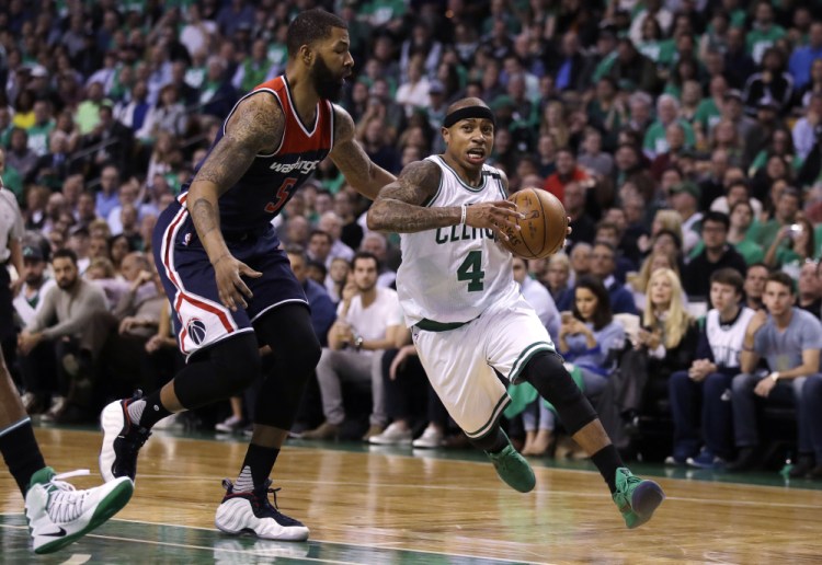 Boston's Isaiah Thomas drives to the basket past Washington's Markieff Morris in the second quarter Wednesday night at Boston.