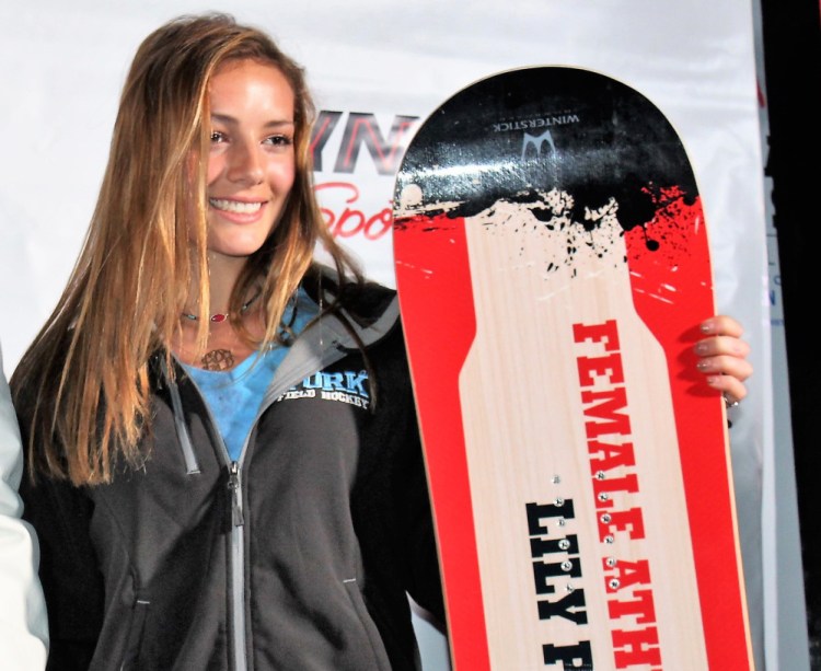 York senior Lily Posternak, posing with her second consecutive Female Athlete of the Year award, will start summer classes at Duke University in June before joining the field hockey team in August.