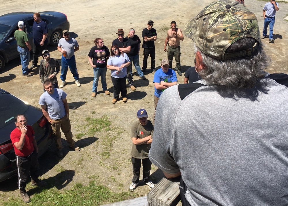 Race director Ed Bellows of China addresses drivers and crews during the pre-race meeting Sunday at Unity Raceway.