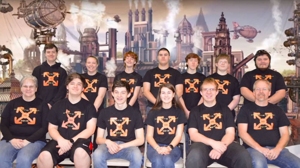 The Infinite Loop team for this school year includes: front row from left, coach Lisa Klein, Michael Viens, Vann Guarnieri, Chelsea Perry, Ethan Pullen and coach Keith McGlauflin; back row from left, mentor Brandon Belanger, Victoria Christianson, Kody King, Delsin Klein, David Hreben, Kai McGlauflin and mentor Justin Shuman.