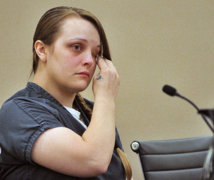 Alyssa Marcellino wipes her eyes Sept. 2, 2015, during her sentencing for conviction on a number of charges including operating after suspension, causing a fatal accident in Monmouth, and others at the Capital Judicial Center in Augusta.