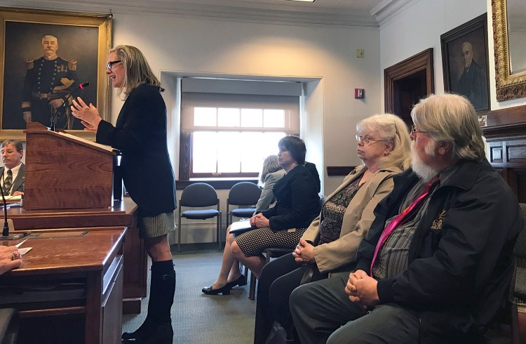 Attorney Cynthia Dill testifies Wednesday before the Legislature's Veterans and Legal Affairs Committee in support of a bill that would allow her to bring a lawsuit to recoup costs that were lost when the state was appointed conservator of William Dean. At right is Dill's client, Pamela Vose, who is Dean's cousin and who, along with Dean's sister, Claire Perry, has taken up the cause since his death last October.