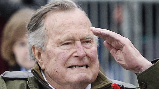 KENNEBUNKPORT, ME - MAY 29: Former first lady Barbara Bush claps and former president George Bush salutes as the Memorial Day Parade in Kennebunkport goes by Monday, May 29, 2017. (Staff photo by Shawn Patrick Ouellette/Staff Photographer)