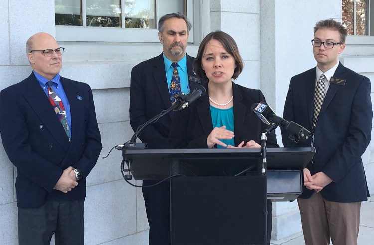 Sen. Shenna Bellows, D-Manchester, speaks about a bill that she introduced to the Maine Legislature that would prohibit internet service providers from selling or sharing subscribers' browsing history and other data to third parties without consent, on Tuesday in Augusta. Behind her, from left, are Rep. Jim Handy, D-Lewiston, and Sens. David Miramant, D-Camden, and Justin Chenette, D-Saco.