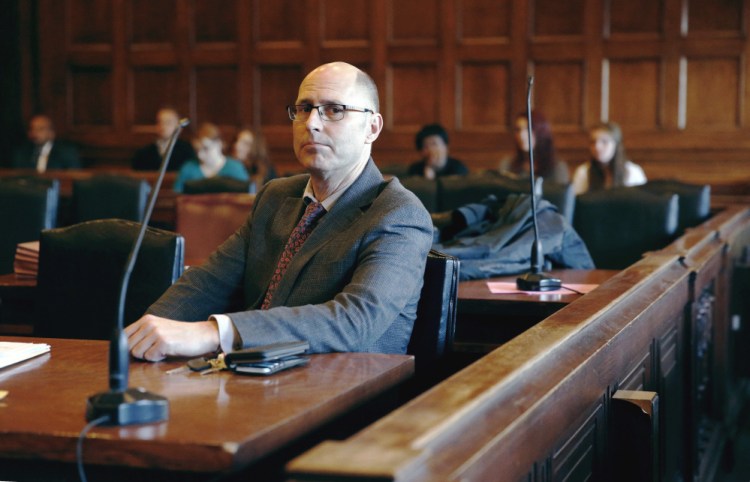 Portland landlord Gregory Nisbet listens during a hearing in February that revisited the case stemming from a fatal fire on Nov. 1, 2014. Nisbet's attorneys have dropped his appeal because he has failed to pay them.